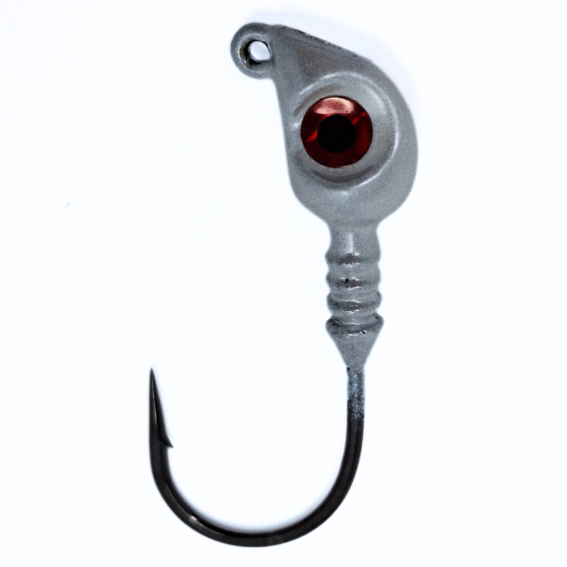 Fishing lure with a red eye and black hook on a white background